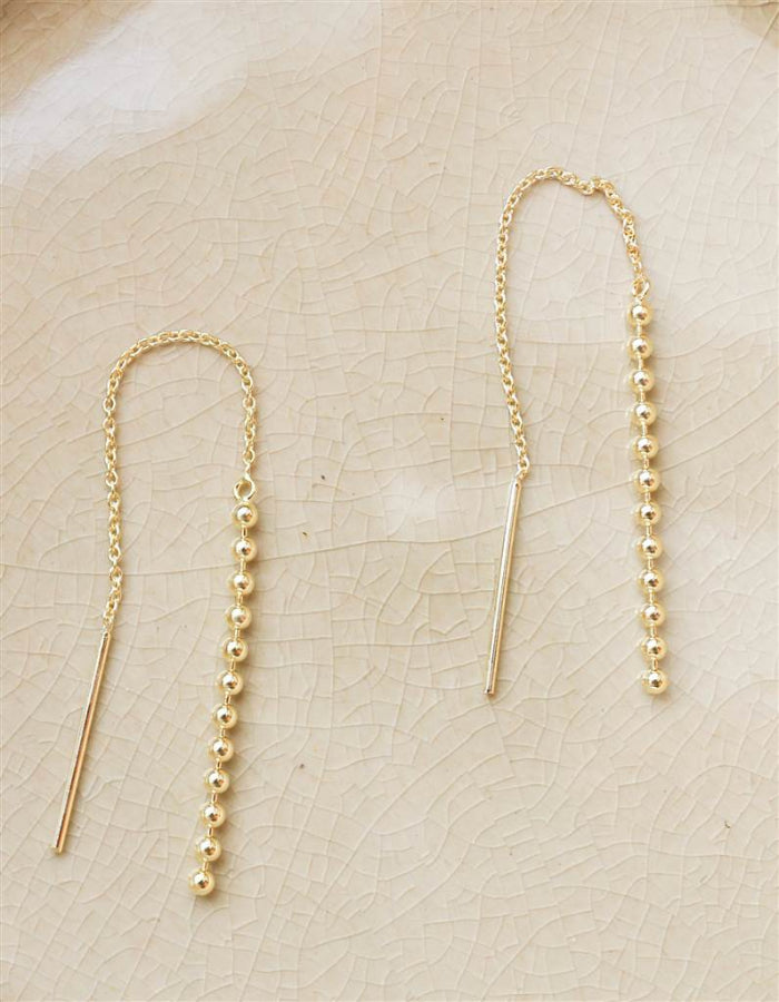 PENDIENTES CAIDA DE BOLITAS ORO