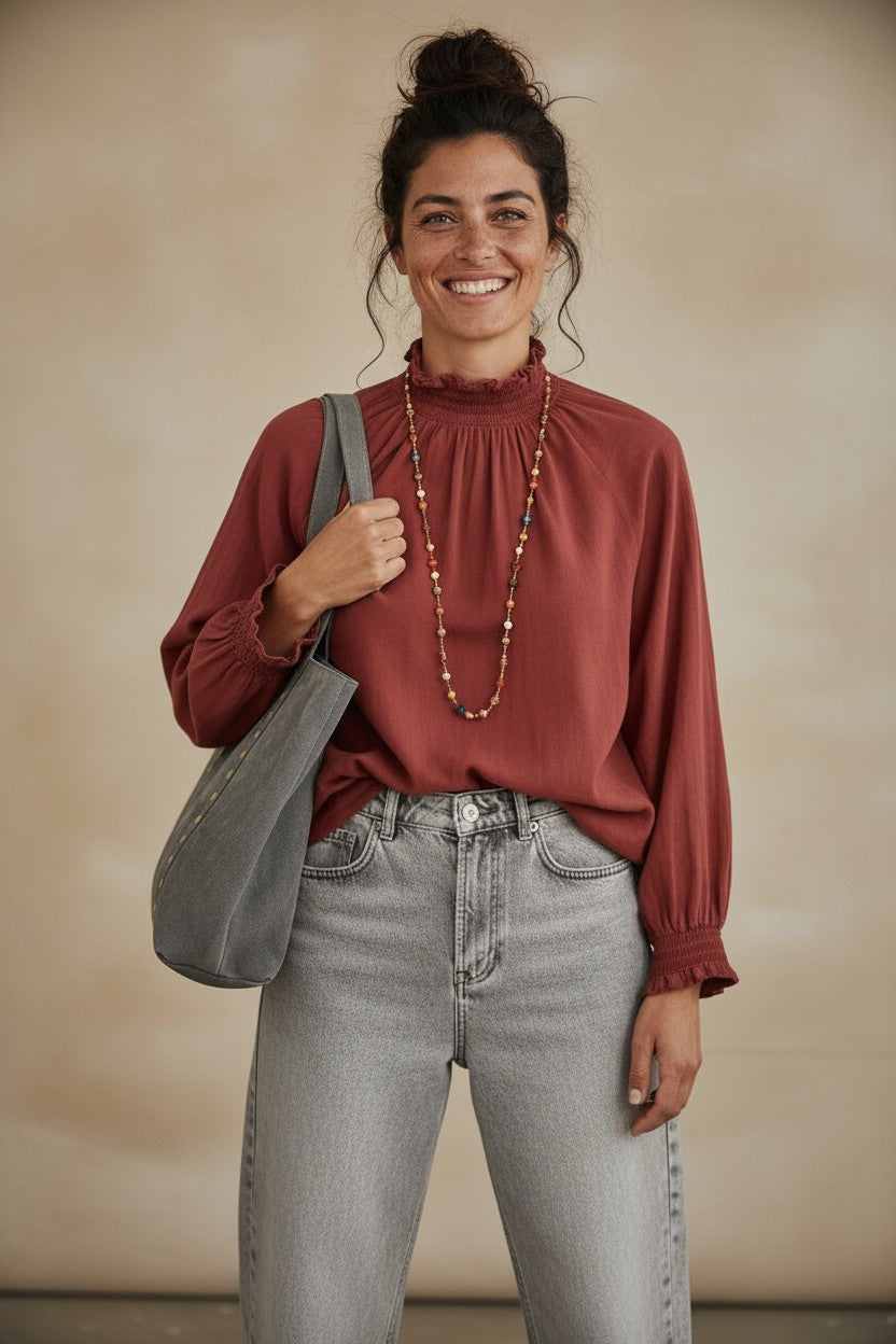 Calendula-shop Olivia long-sleeve blouse in rust red cotton with a ruffled neck and button back closure