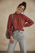Calendula-shop Olivia long-sleeve cotton blouse in terracotta with a ruffled neck and button back detail